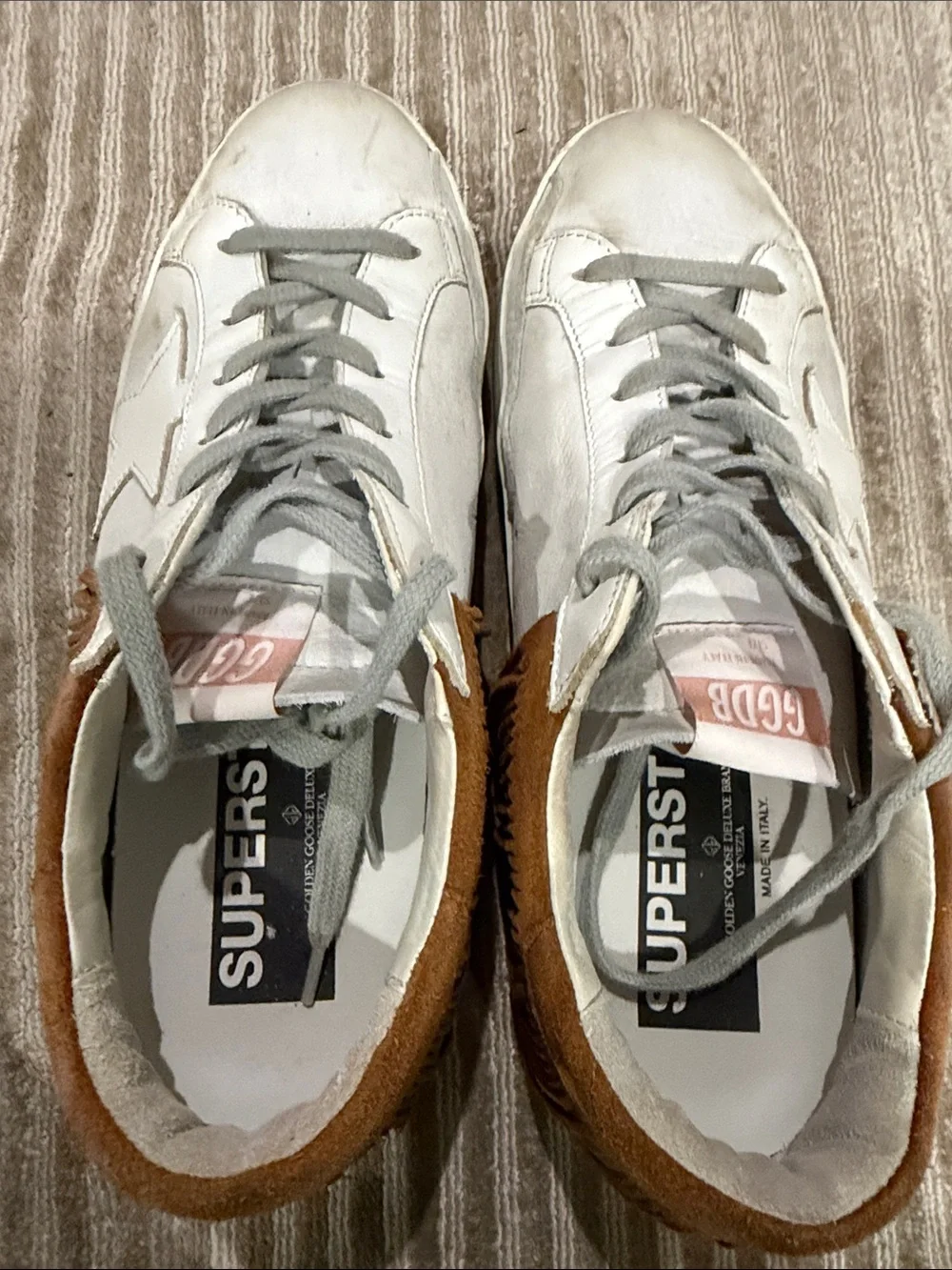 Golden Goose Women’s White Nubuck Low Top Super Star with Brown suede fringe.